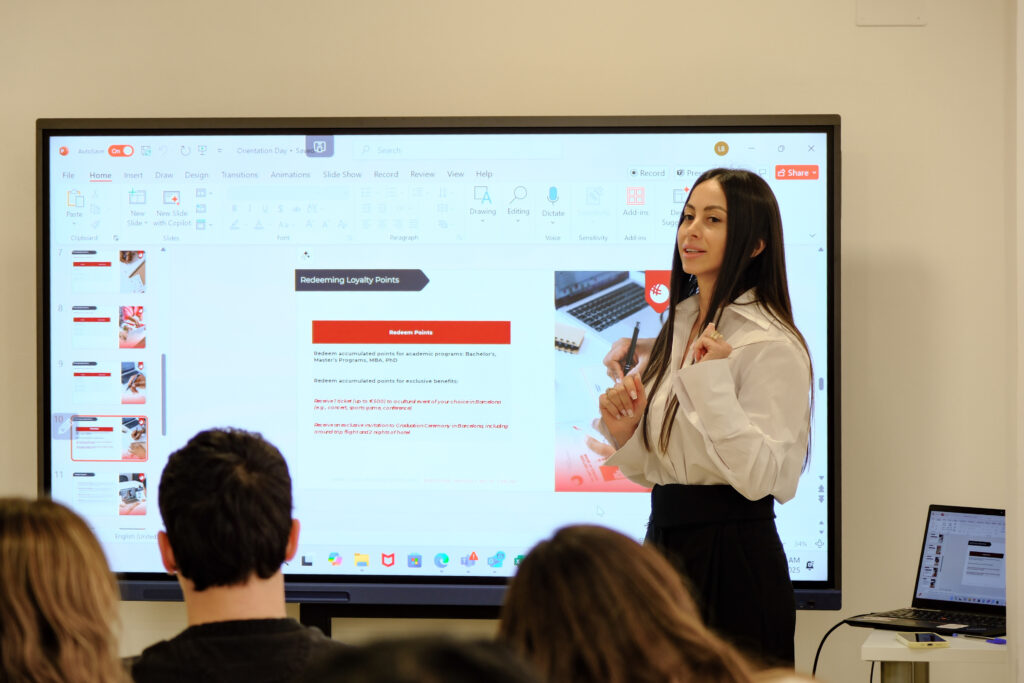A GBSB Global class working through digital marketing software on the classroom screen