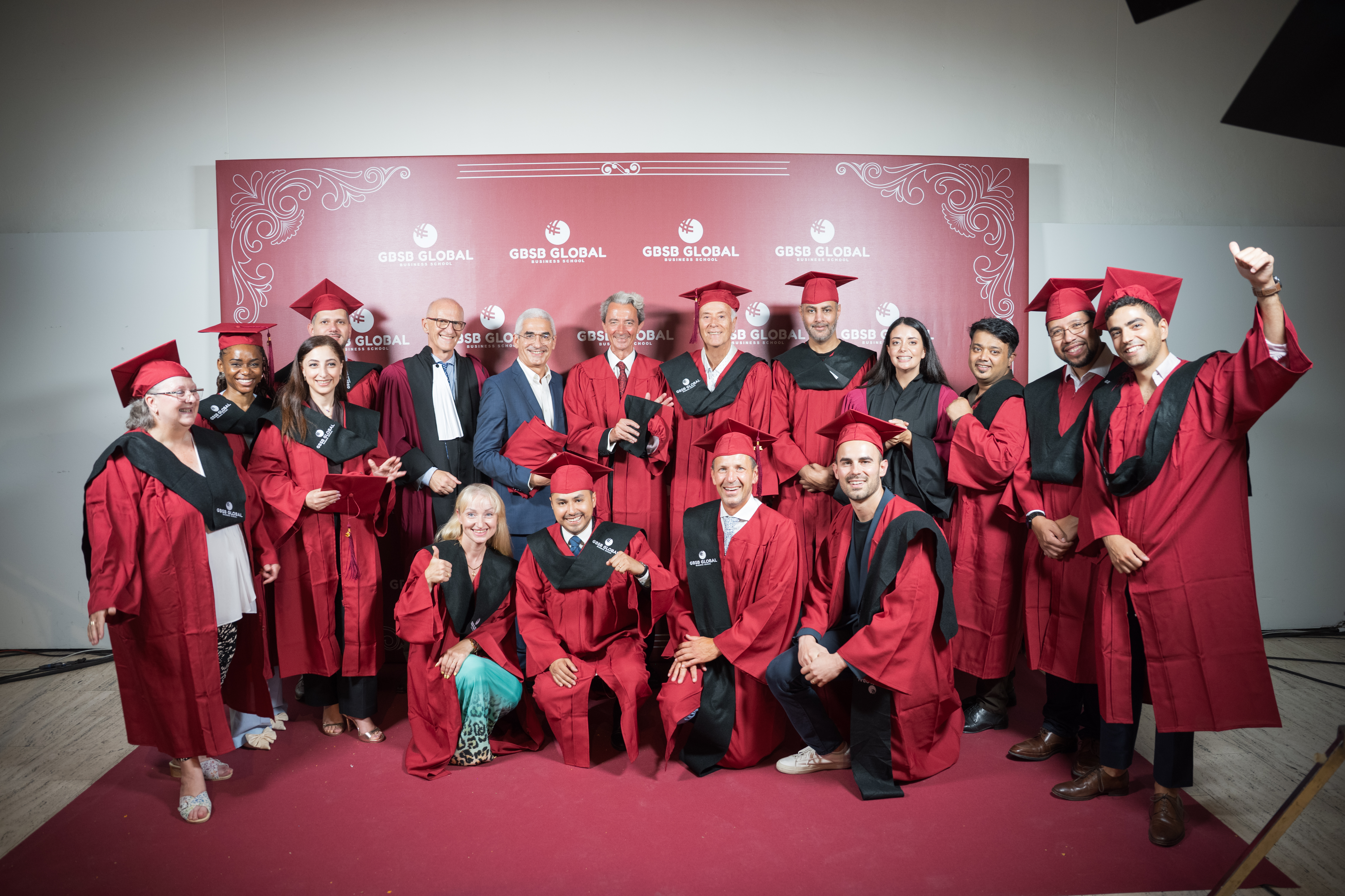 GBSB Global graduates in doctoral robes