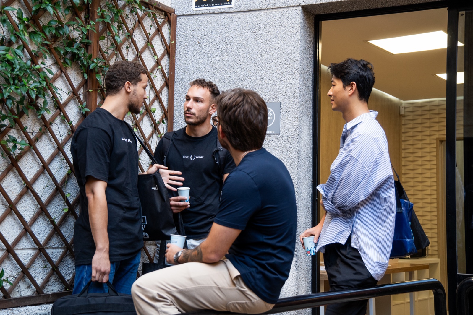 GBSB Global bachelor students talking outside the campus entrance